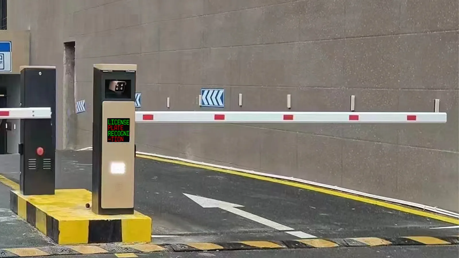 License plate recognition parking system with LPR camera and barrier gate at parking lot entrance